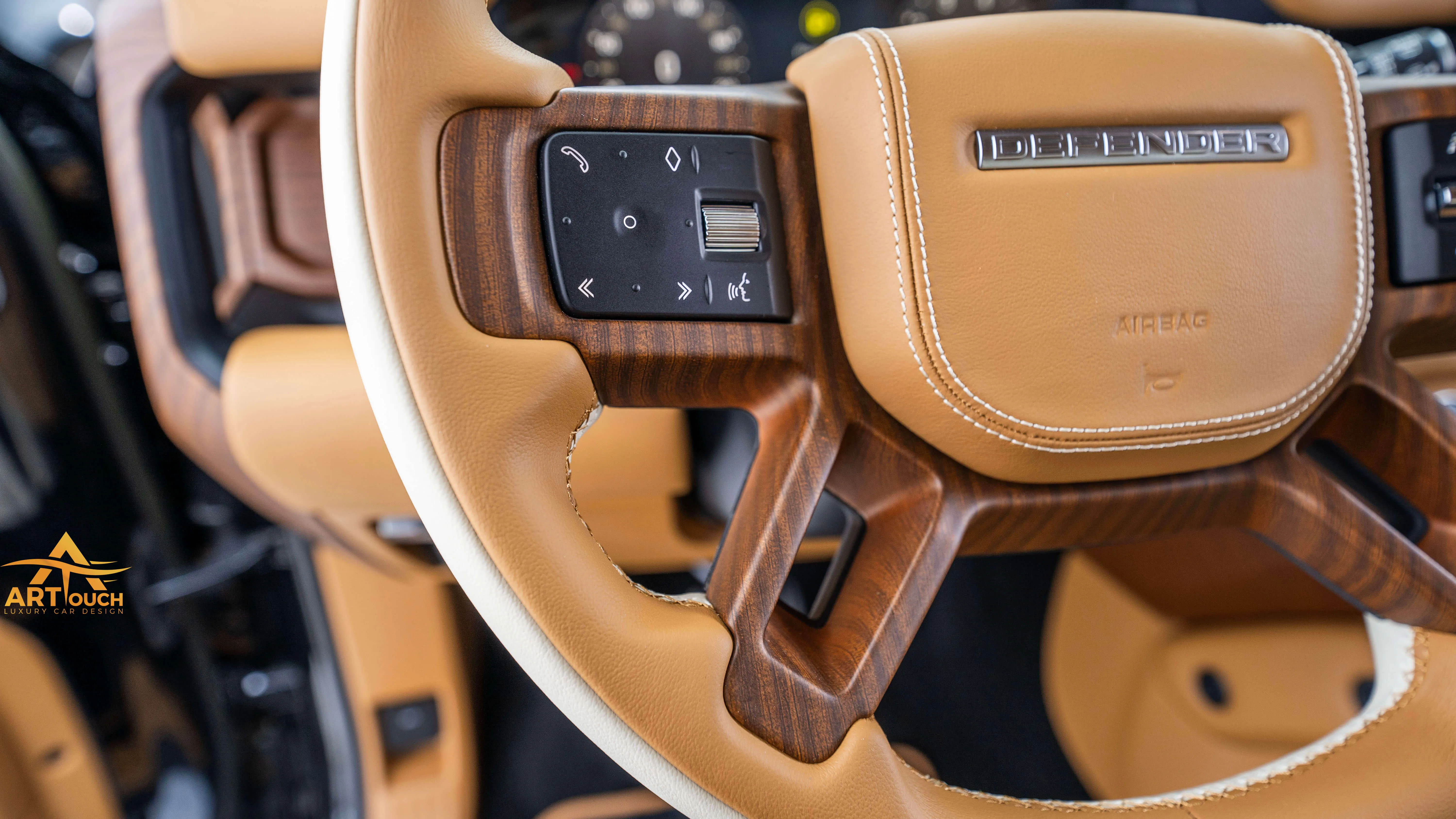 Bespoke Defender leather cabin. Premium Alcantara steering, custom gear knobs, and door panels crafted for a supreme luxury feel