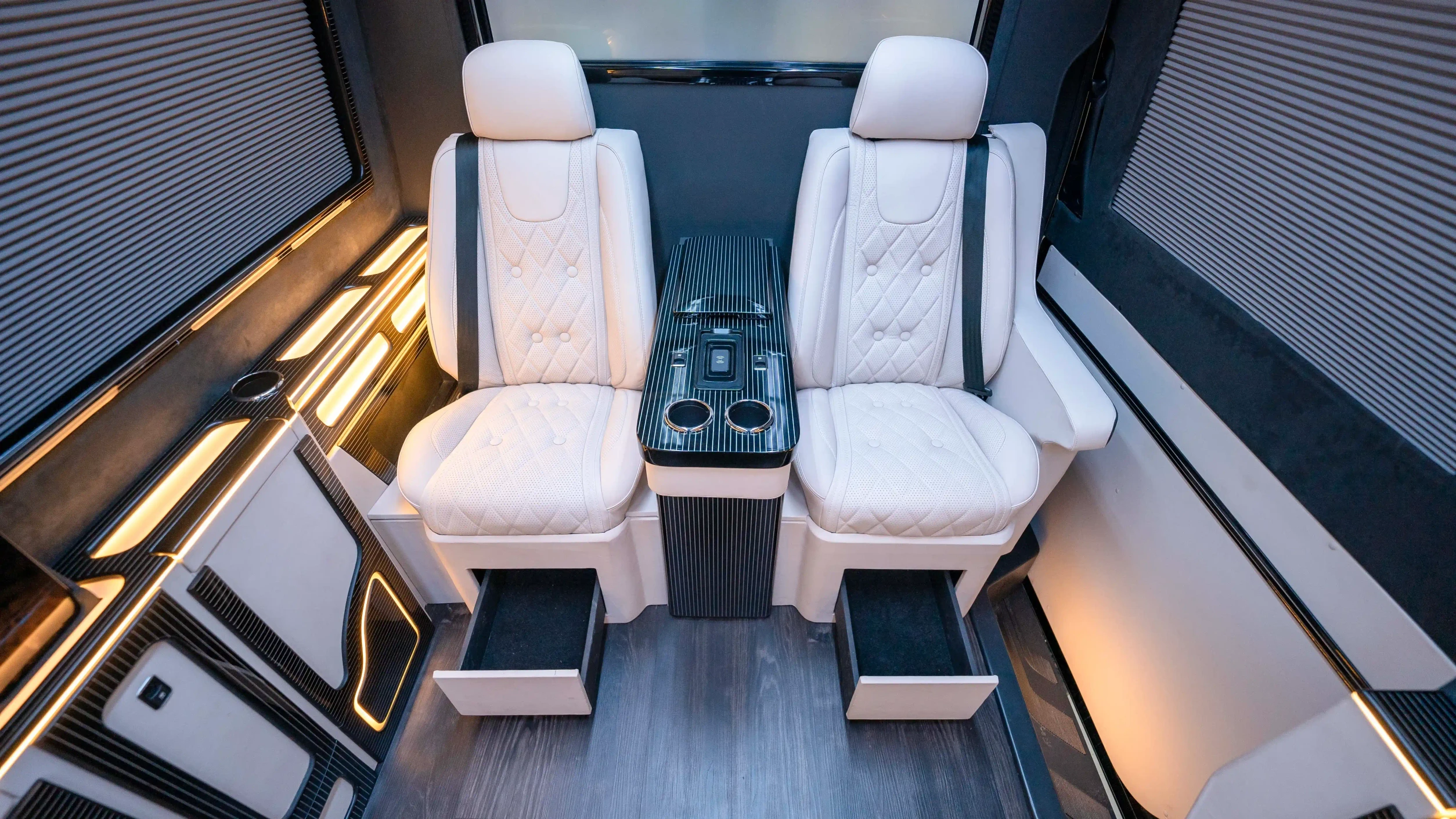 Mercedes Sprinter VIP Interior Upholstery Dubai – Custom White Nappa Leather and Black Alcantara Luxury Cabin Upgrade with Premium Reclining Seats