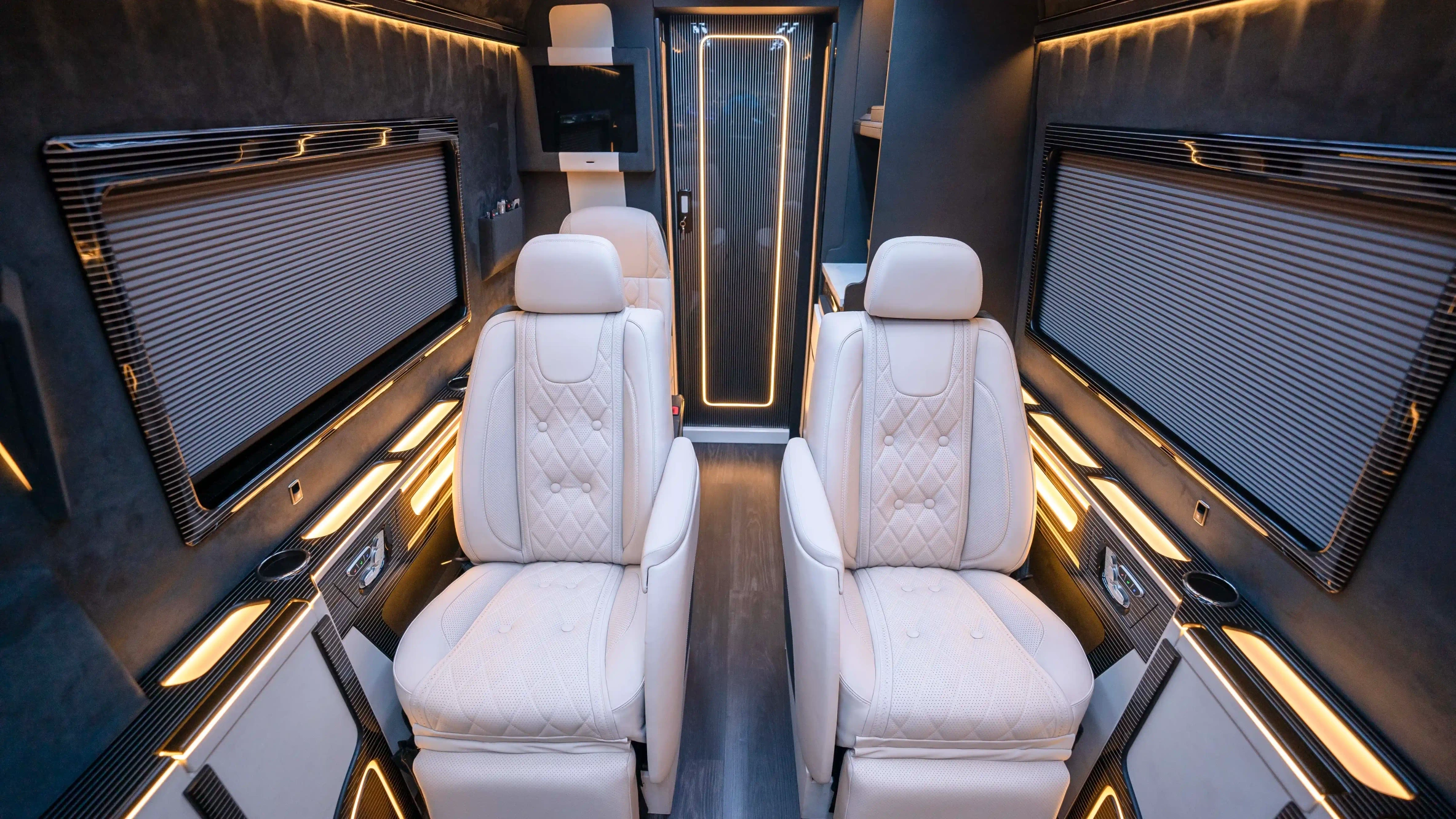 Dubai Mercedes Sprinter VIP Interior Conversion – Handmade White Leather & Alcantara Upholstery, Premium Lounge Seating, Elite Van Modification