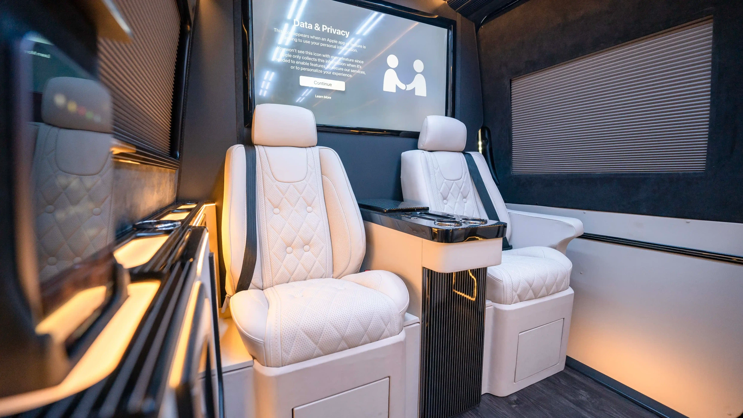 Mercedes Sprinter VIP Interior Upholstery Dubai – Custom White Nappa Leather and Black Alcantara Luxury Cabin Upgrade with Premium Reclining Seats